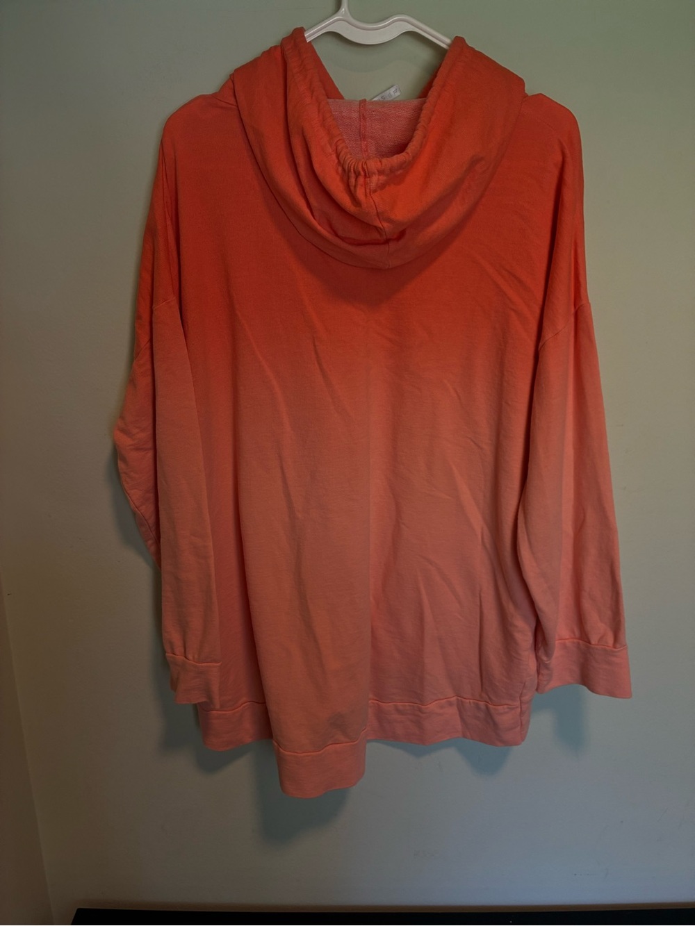 Hooded sweatshirt with label visible - Picture 2 of 3